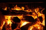 A hot fire is needed to boil sap in the evaporator pan