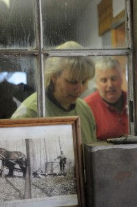 Maria and Steve Glabach and a photo of Steve's dad with his sugaring "team"